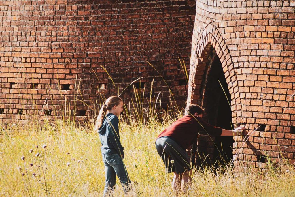 Kids looking into kilns